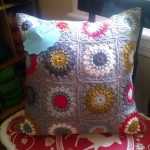 sunburst granny square pillow closeup