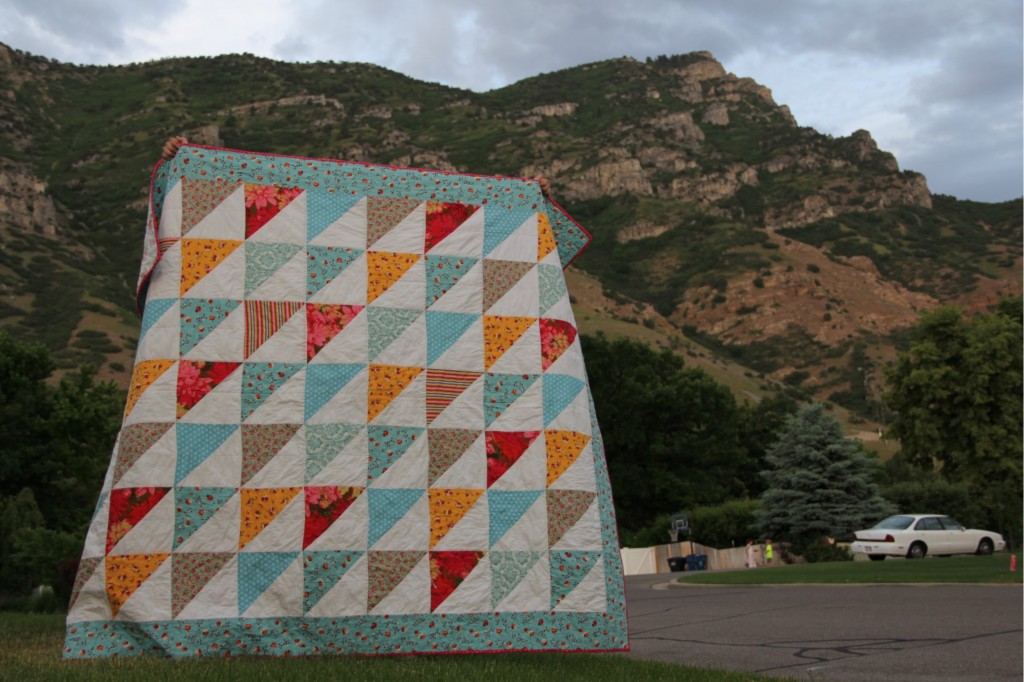 alipyper G holding her quilt
