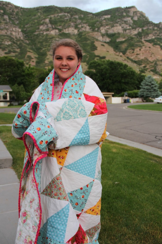 alipyper G wrapped in her quilt